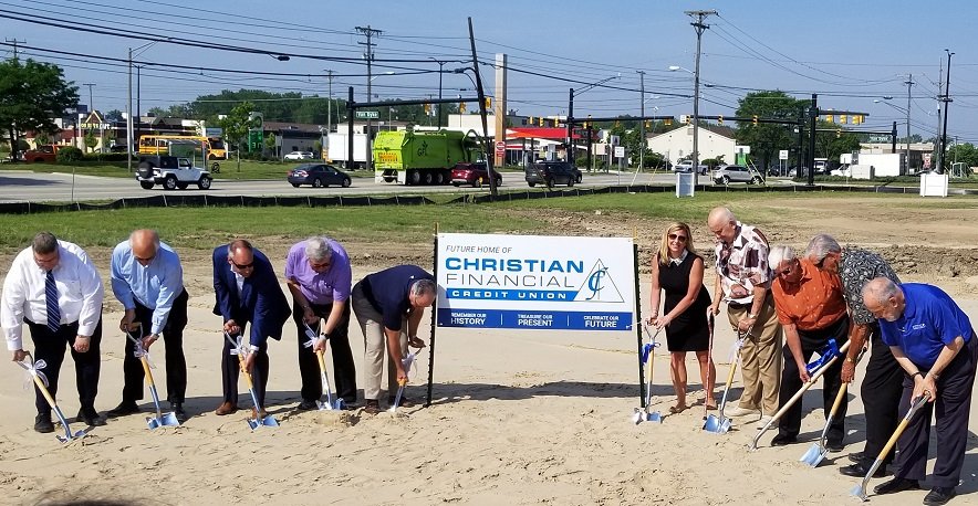 Bank Employees Digging with Shovels